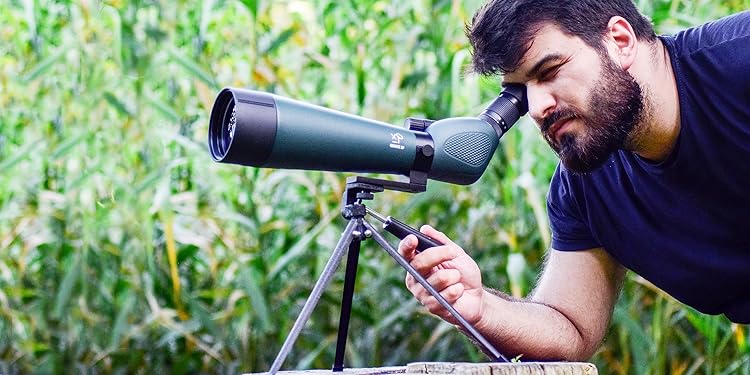 CREATIVE-XP-Spotting-Scopes-20x60-80mm man viewing with spotting scope
